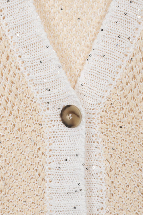 Cardigan con bordi in paillettes