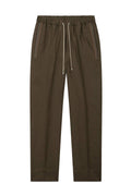 TONET Pantalone jogging in lino, con elastico, coulisse e dettagli in maglia sulle tasche. Gamba dritta. Per una donna che cerca un look sportivo, con un tocco chic.