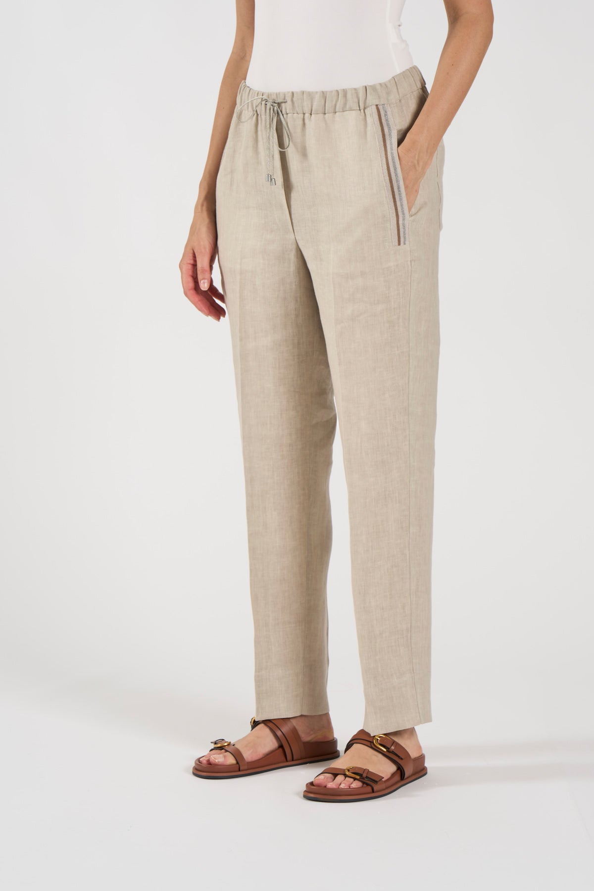 TONET Pantalone jogging in lino, con elastico, coulisse e dettagli in maglia sulle tasche. Gamba dritta. Per una donna che cerca un look sportivo, con un tocco chic.